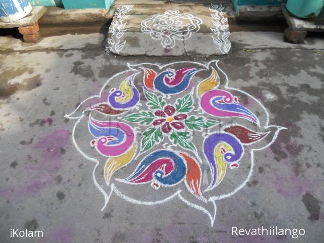 Rangoli: Flying colour colour cranes kolam.