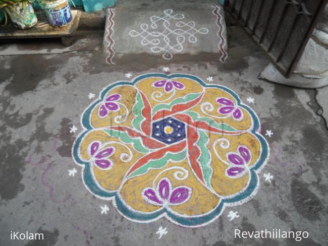 Rangoli: Very simple yellow rangoli.