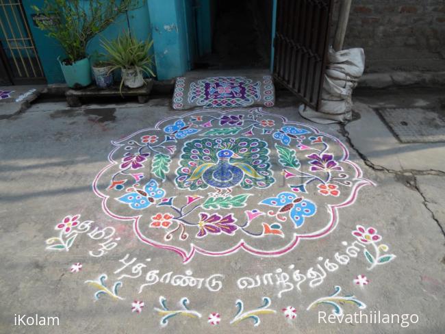 Rangoli: Tamil Puthandu Vazuthukal in advance. Dancing Peacock & Butterflies with flowers.