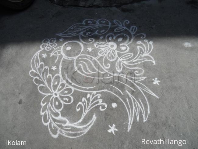 Rangoli: Daily kolam. Parrot on a branch.