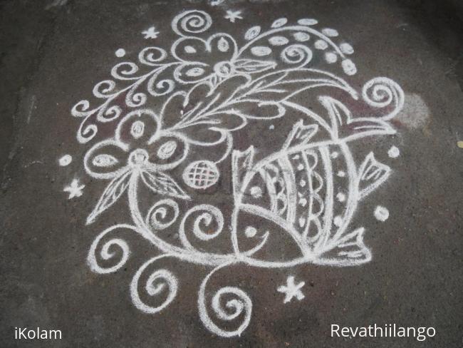 Rangoli: My daily  kolam. Fish with pookothu.