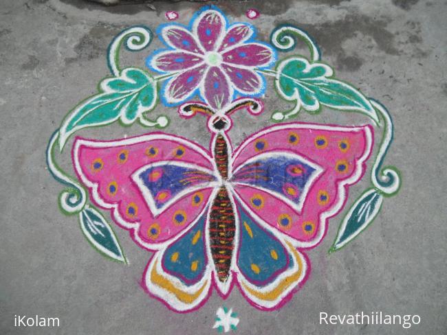 Rangoli: Butterfly flower kolam.