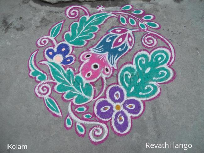 Rangoli: A different try of floral design.