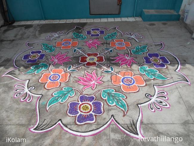 Rangoli: Flower kolam with lotus & leaves in different style.