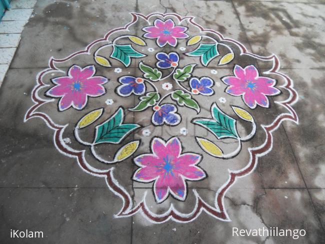 Rangoli: A big flower, embeded with small flowers. Kolam.