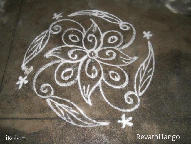 Rangoli: Daily white kolam.