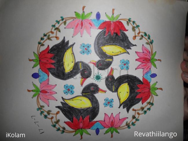 Rangoli: Paper rangoli. Ducks on lotus kolam.