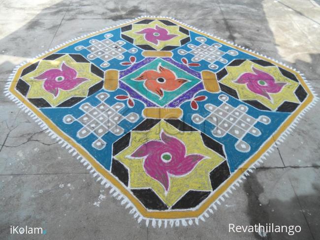 Rangoli: Chikku kolam, star & flower mixed rangoli carpet