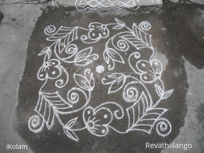 Rangoli: Daily kolam in white.