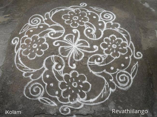 Rangoli: Bird & flower kolam.