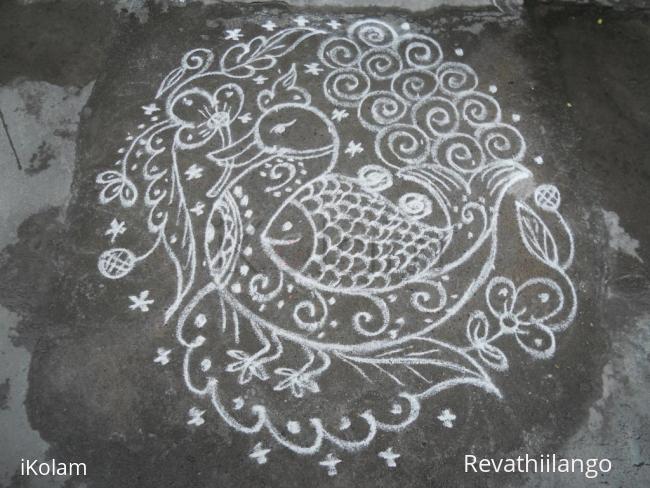 Rangoli: Swan & fish, two in one kolam.