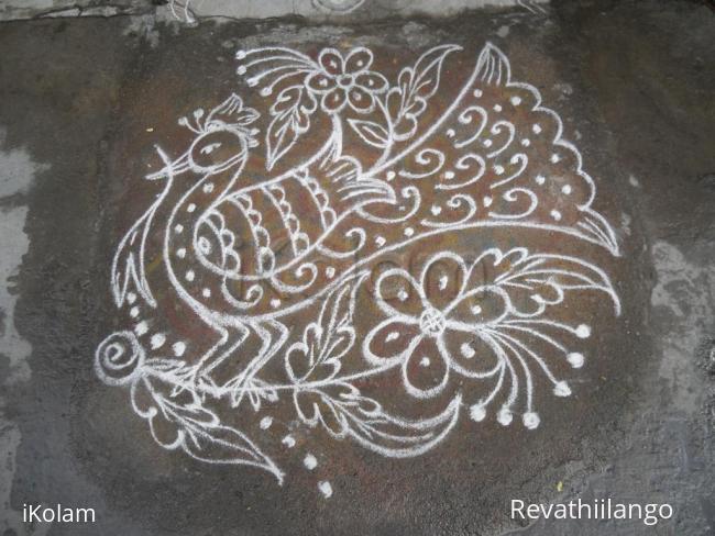 Rangoli: Rev's freehand peacock.