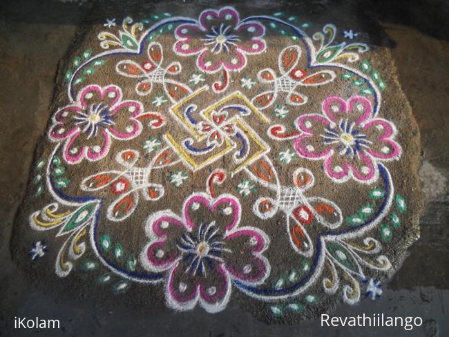 Rangoli: Rev's swasthik, chikku & flower kolam.