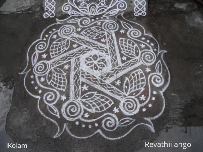 Rangoli: Rev's new type white kolam.