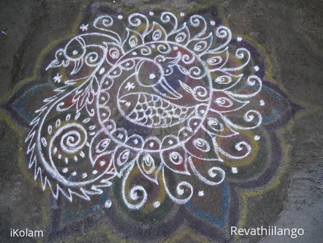 Rangoli: Rev's freehand peacocks.