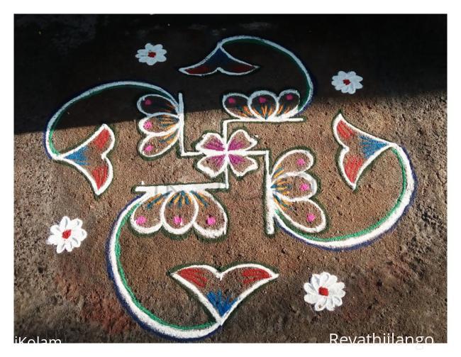 Rangoli: Rev's daily kolam in swastik.