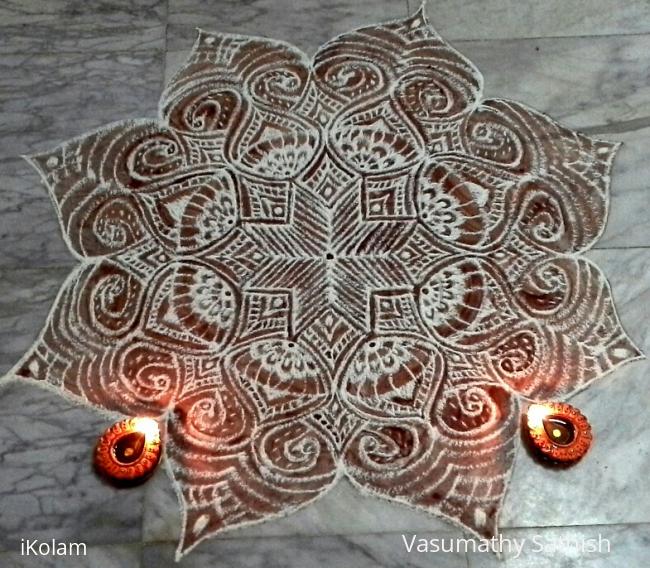 Rangoli: Freehand kolam  for margazhi with rice flour and kavi