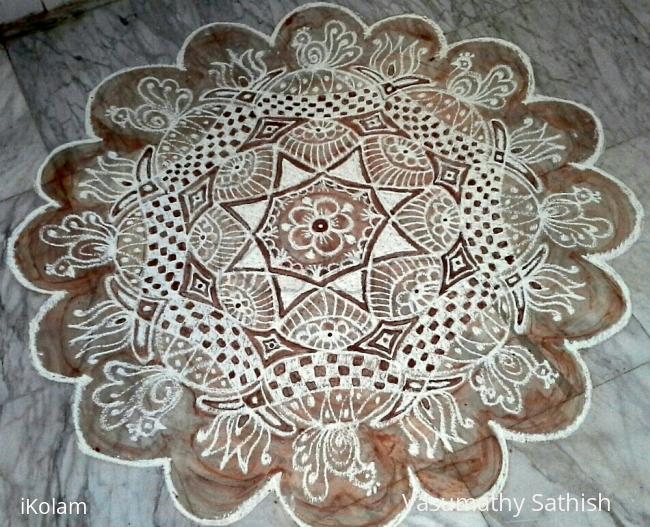 Rangoli: Padi kolam with rice flour  and kavi for margazhi