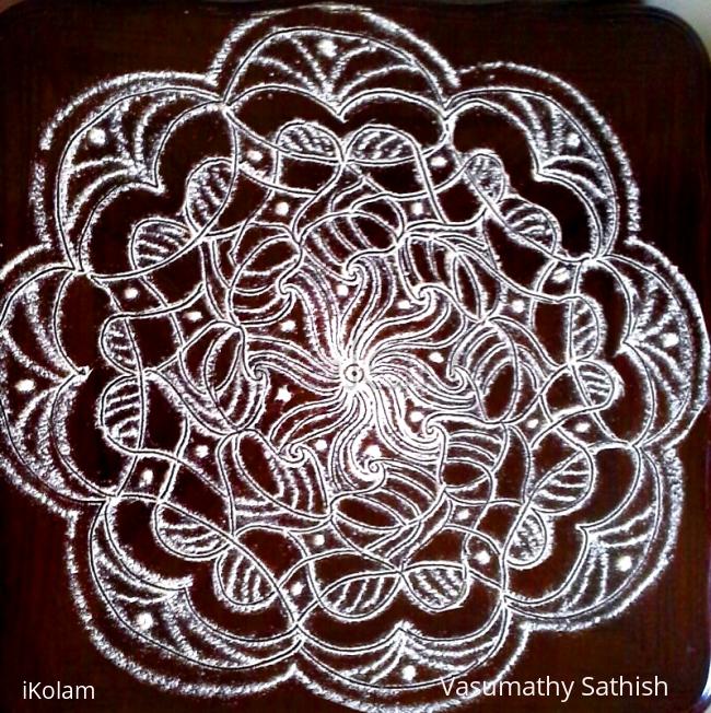 Rangoli: freehand rangoli with rice flour