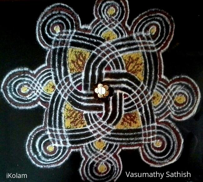 Rangoli: Friday Pooja kolam with rice flour coloured with haldi and kumkum