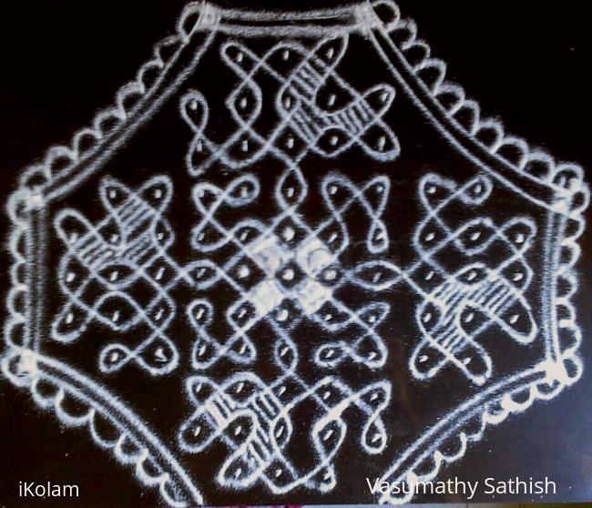 Rangoli: Chikku kolam in black and white combo. 11×3; 9×1; 5×2; 3×1 straight dots.