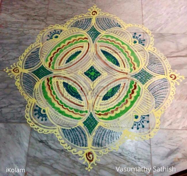 Rangoli: Day 4 Navarathiri Padi Kolam with rice batter and green colour 