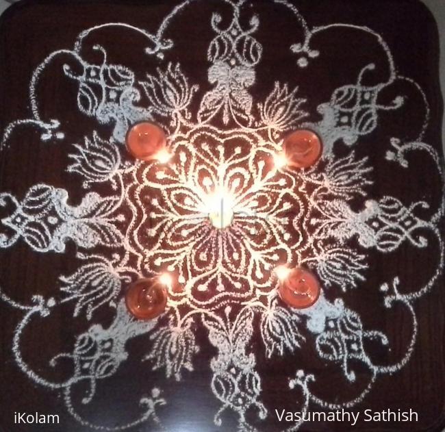 Rangoli: freehand rangoli with rice flour