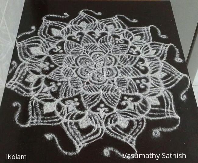 Rangoli: freehand rangoli with rice flour