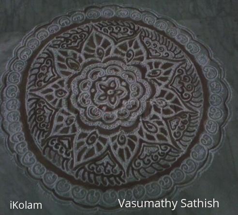 Rangoli: Free hand kolam with rice flour and kavi for margazhi