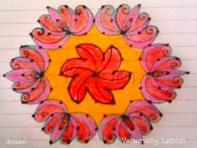 Rangoli: Floral rangoli with 11- 6 interlaced dots