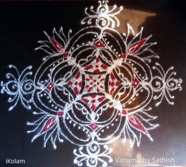 Rangoli: Day 7 Navarathiri Padi Kolam with White  and red colour 