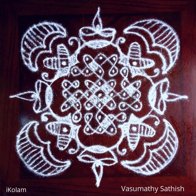 Rangoli: Chikku with 7 dots 3 lines till 3 straight dots. 