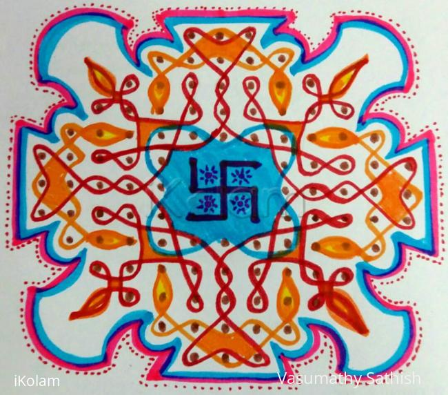 Rangoli: Chikku kolam with 13 dots 3 lines till 3 straight dots. 