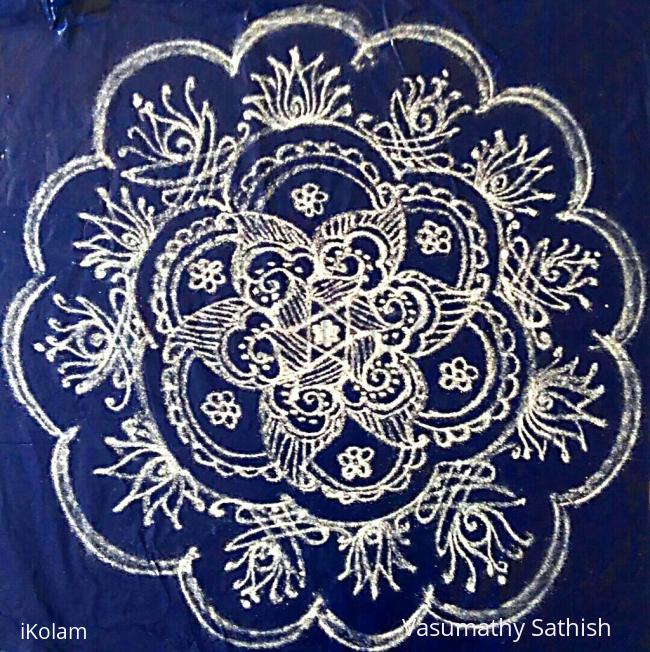 Rangoli: Margazhi Day 11 kolam - A freehand design with kolamavu on Blue plastic cover 