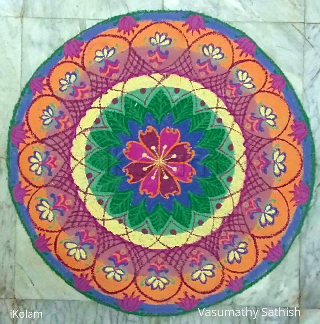 Rangoli: Margazhi Day 7- A freehand floral rangoli with colours 