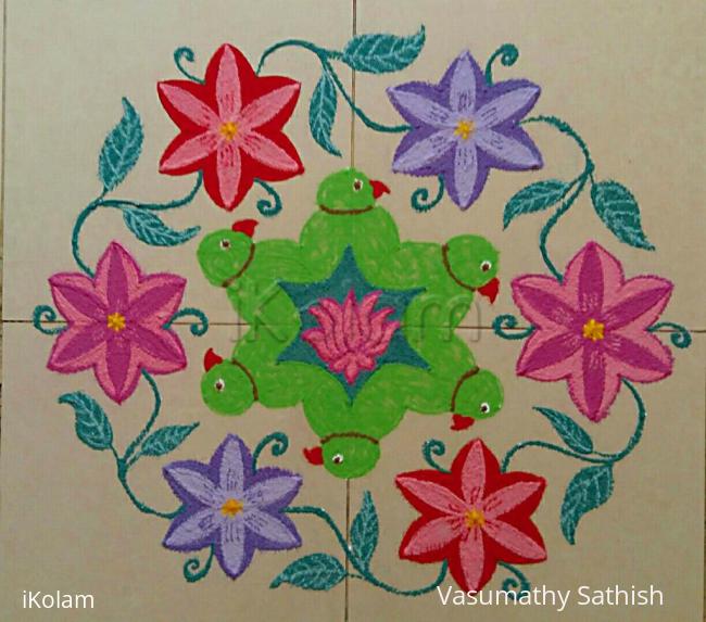 Rangoli: Margazhi Day 28 Kolam -  A  dotted parrot with flowers rangoli with 15-8  interlaced dots. 