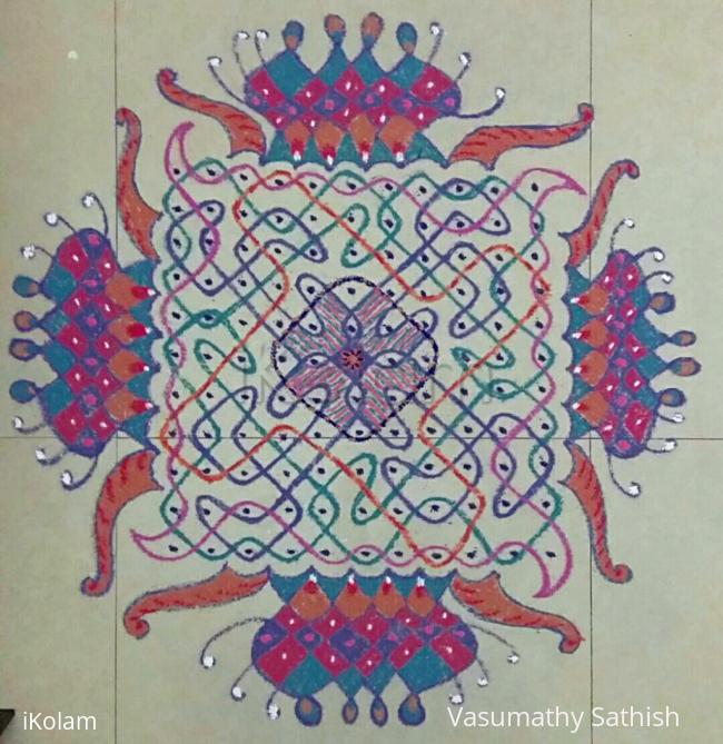 Rangoli: Chikku Kolam with 11-11 straight dots with freehand extension