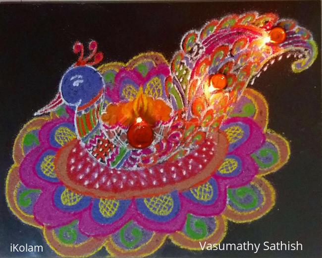 Rangoli: Peacock Rangoli with diyas