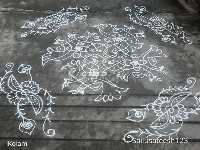 Rangoli: White chikku kolam with birds