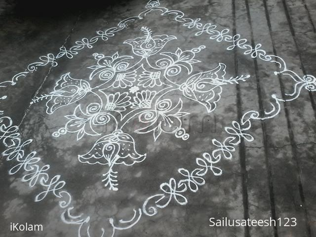 Rangoli: Flower rangoli with 14-2 dots