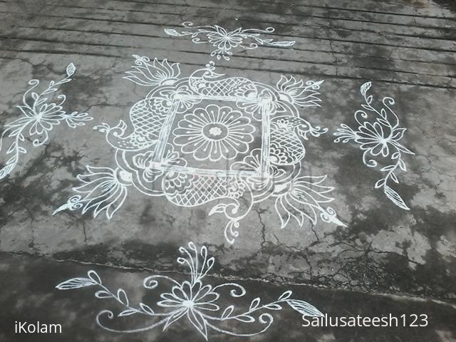 Rangoli: Freehand lotus rangoli with peacocks