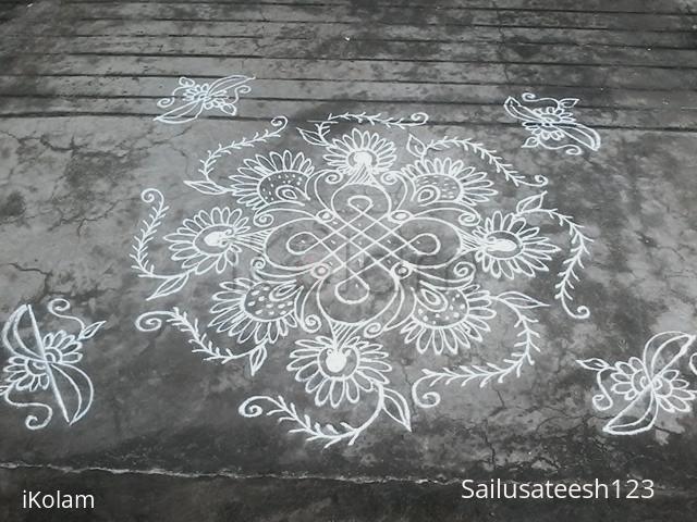 Rangoli: Chikku kolam with decoration...