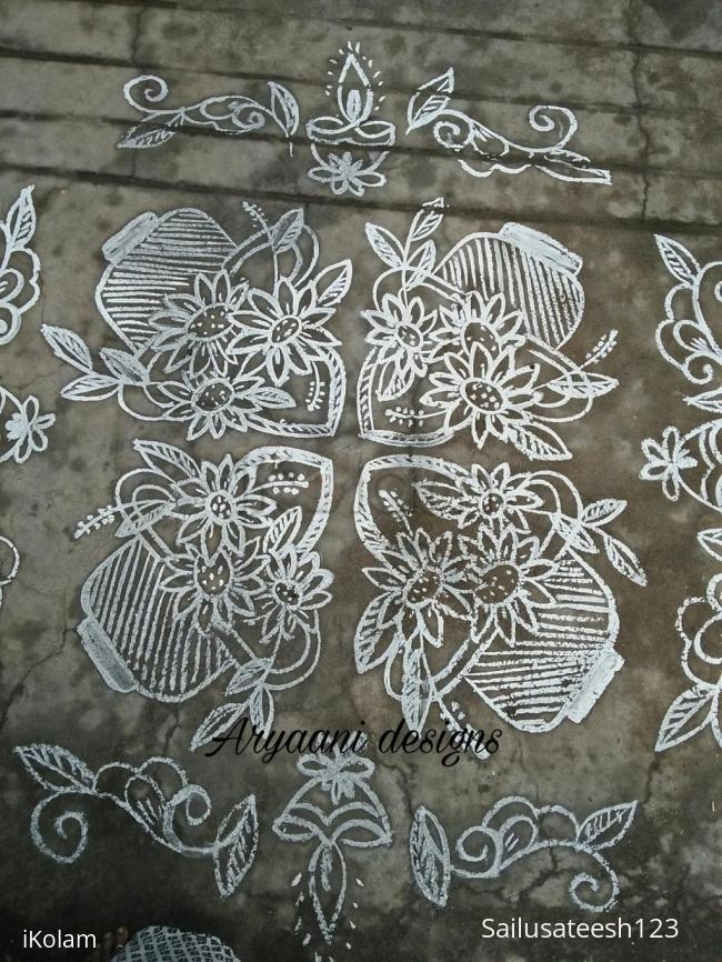 Rangoli: Simple flower baskets.....