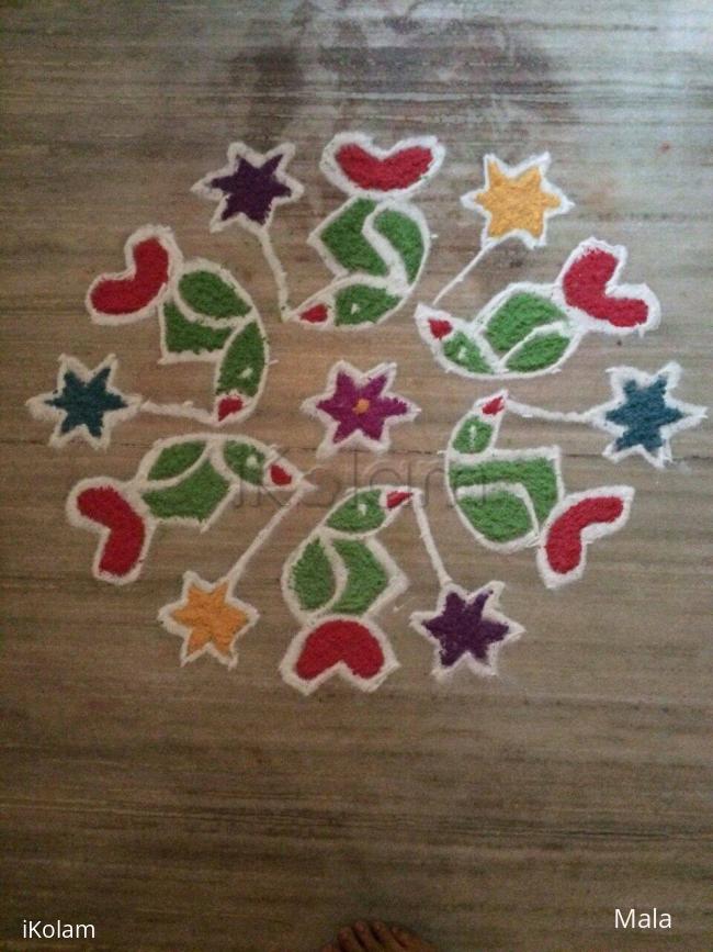 Rangoli: Parrot kolam