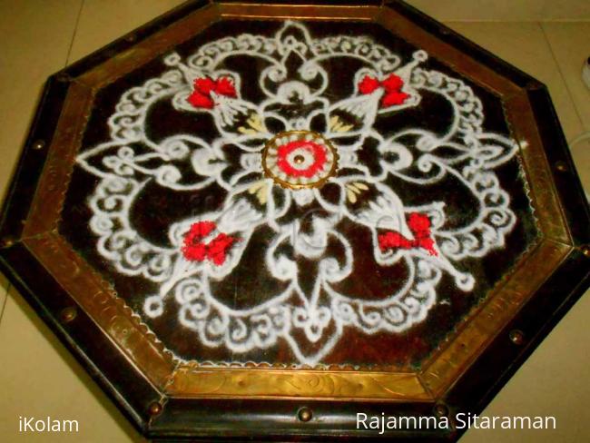 Rangoli: Designer top kolam.